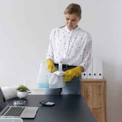person-taking-care-office-cleaning