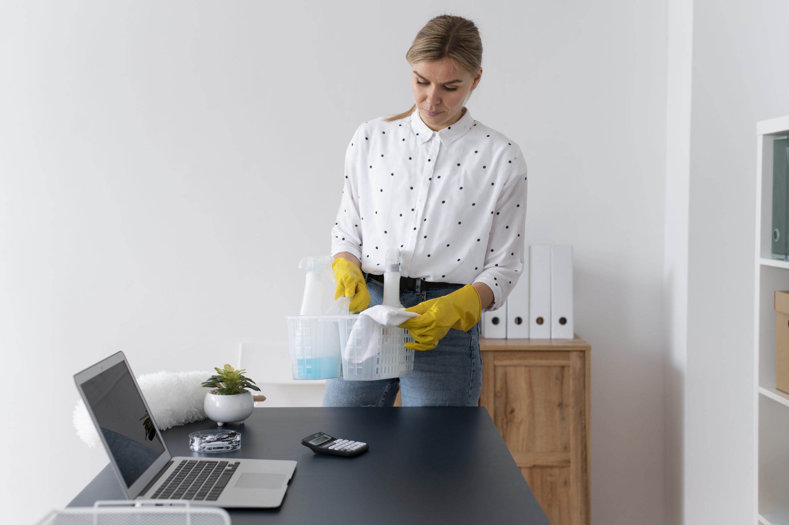 person-taking-care-office-cleaning